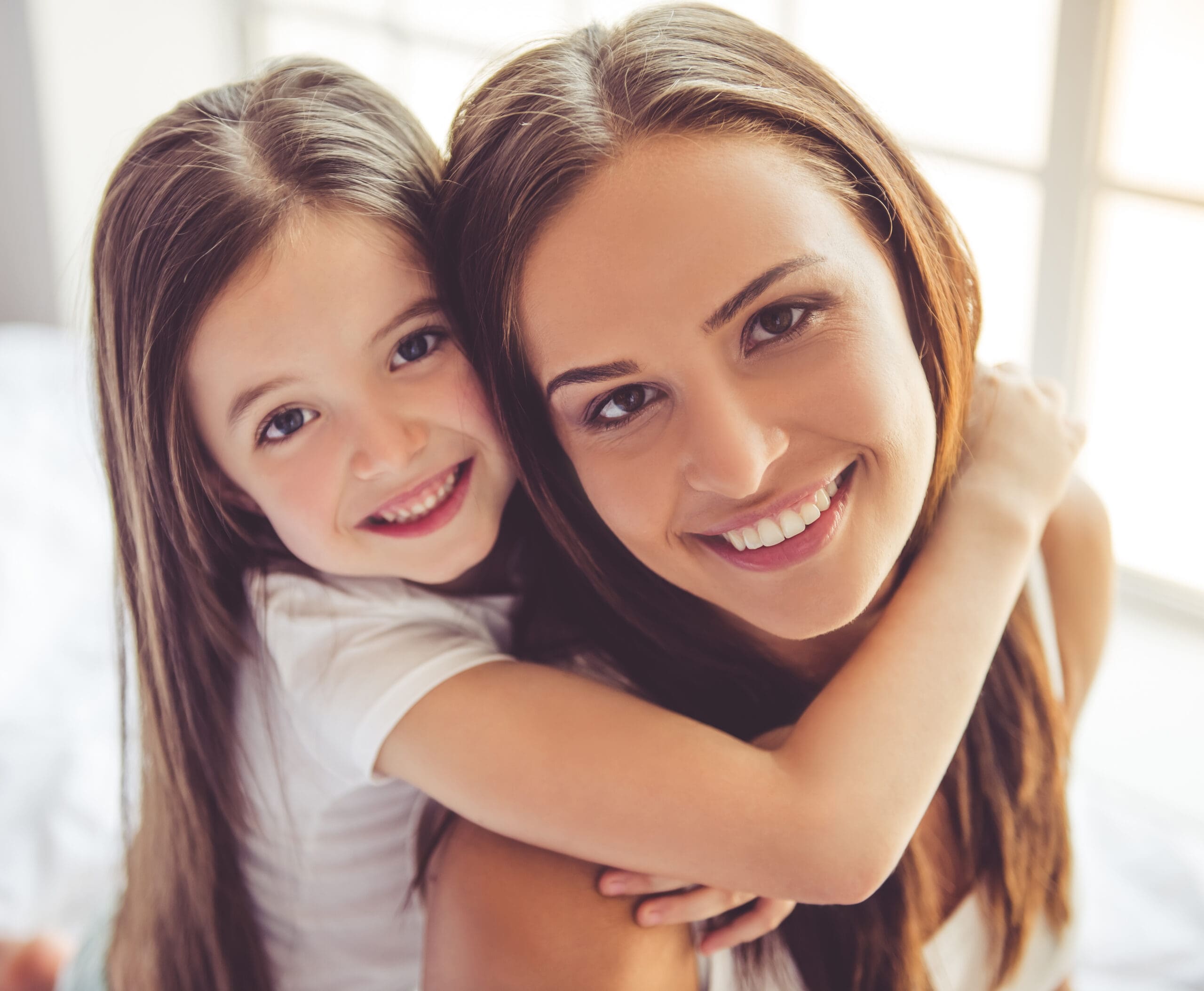 Mother and daughter at home