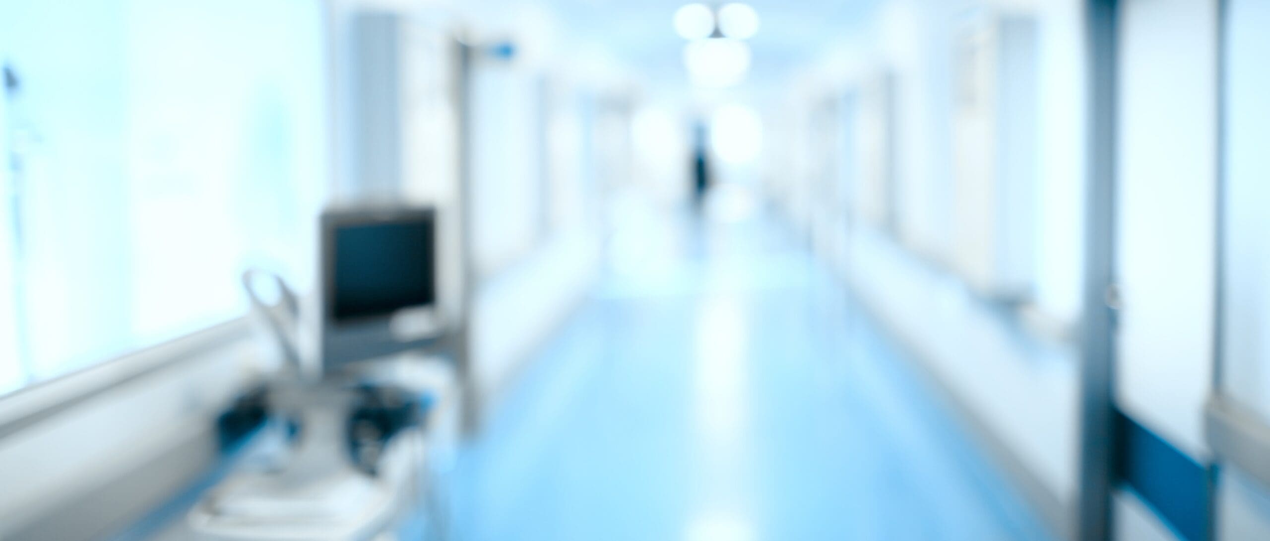 Blurred hospital hallway, unfocused background